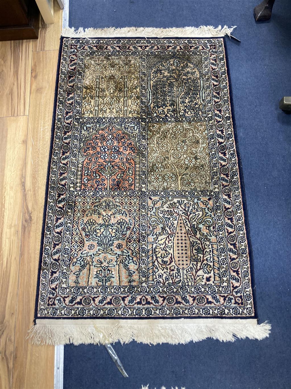 A North West Persian prayer rug, 120 x 77cm, together with a smaller red ground rug
